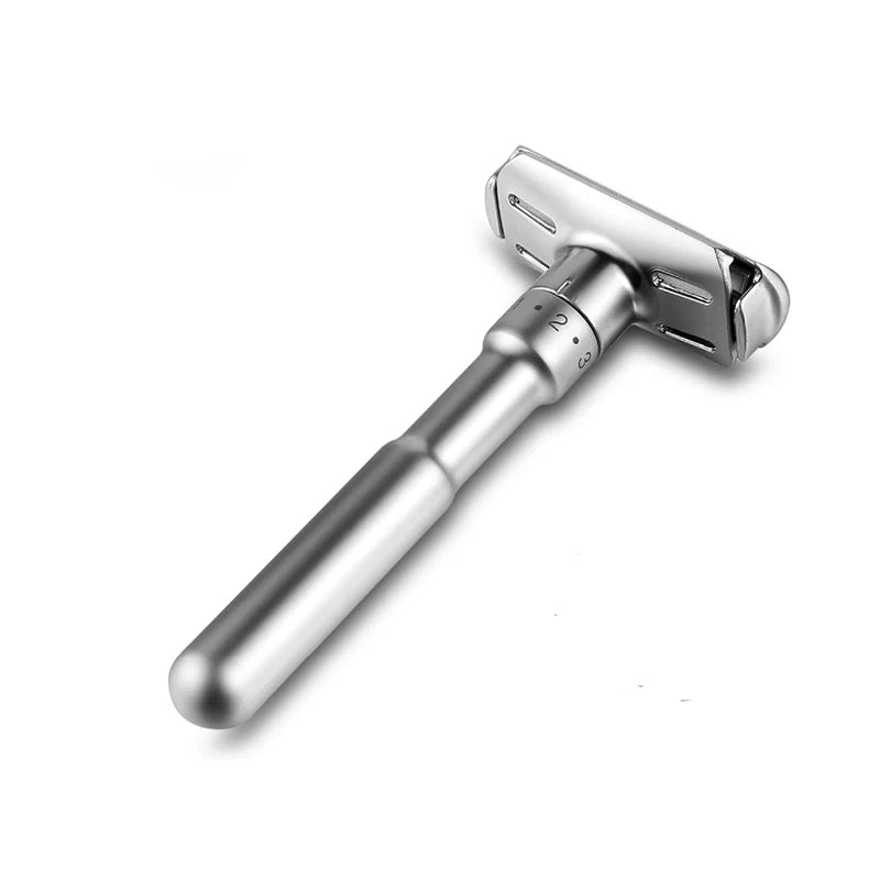 Silver safety razor on a white background