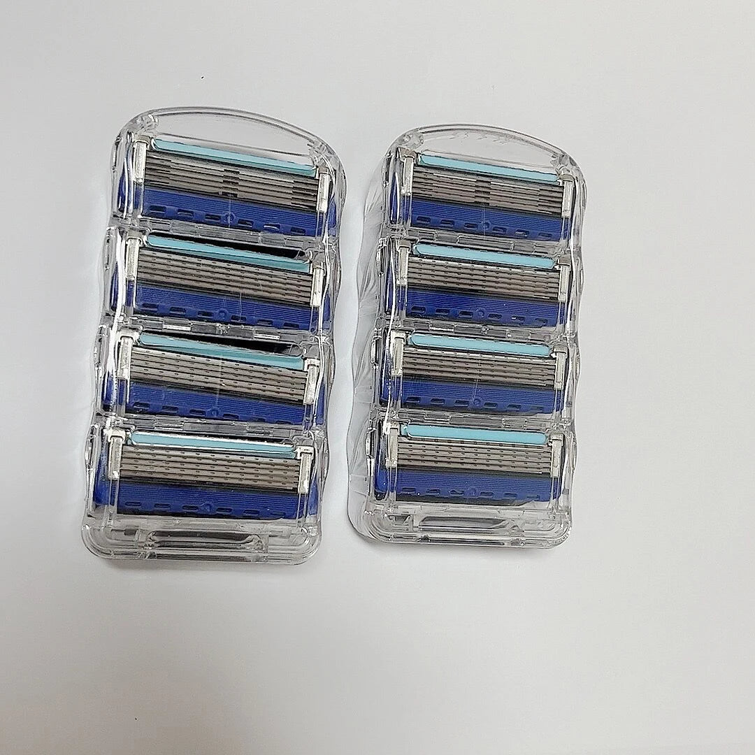 Two clear plastic cases with multiple blue and silver razor heads on a white background