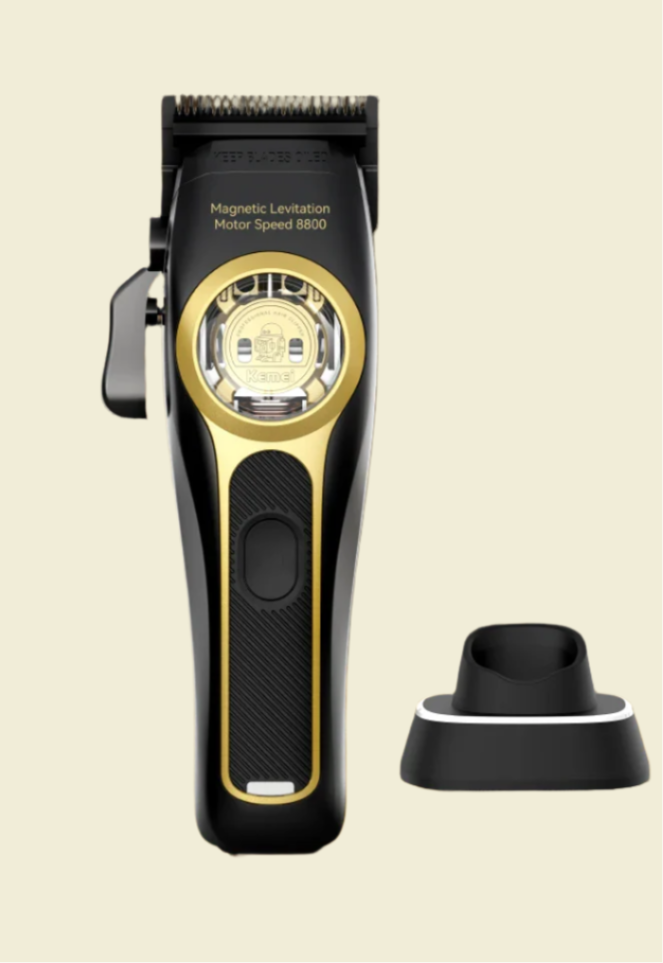 Hair trimmer with gold accents on a beige background