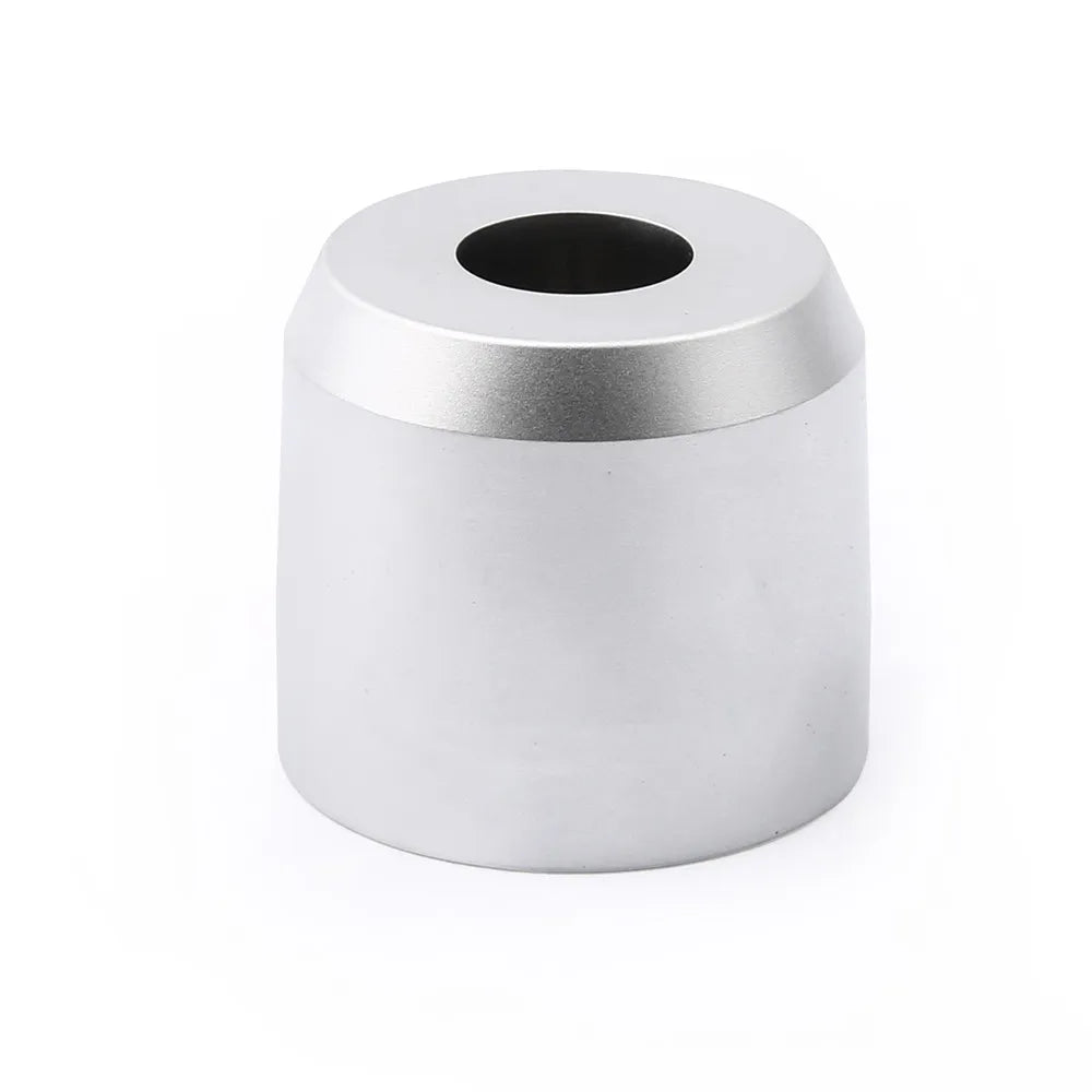 Silver shaver holder with a black center on a white background