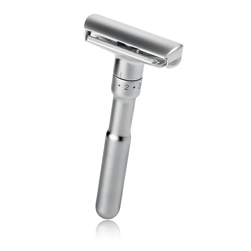 Silver safety razor on a white background