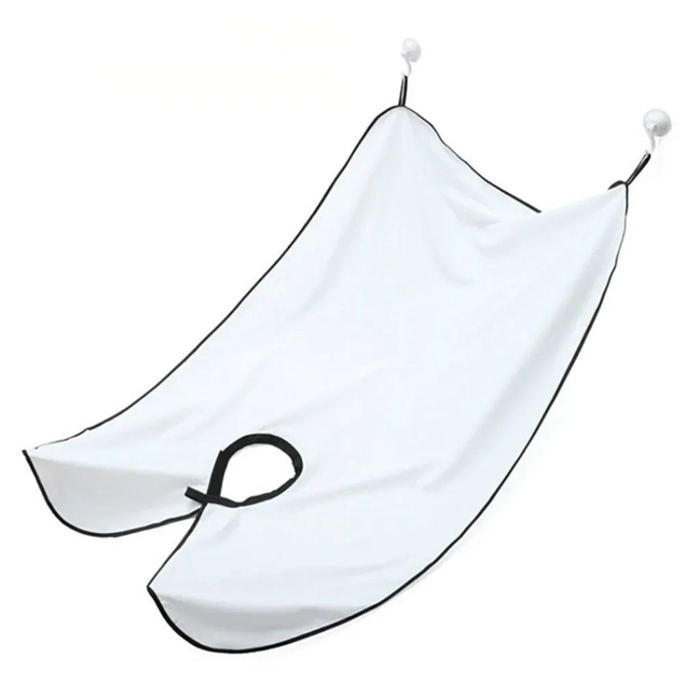 White towel with black trim hanging on a white background