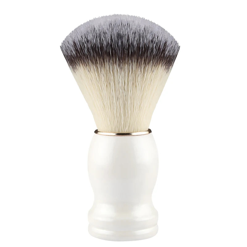 White shaving brush with black and white bristles on a white background