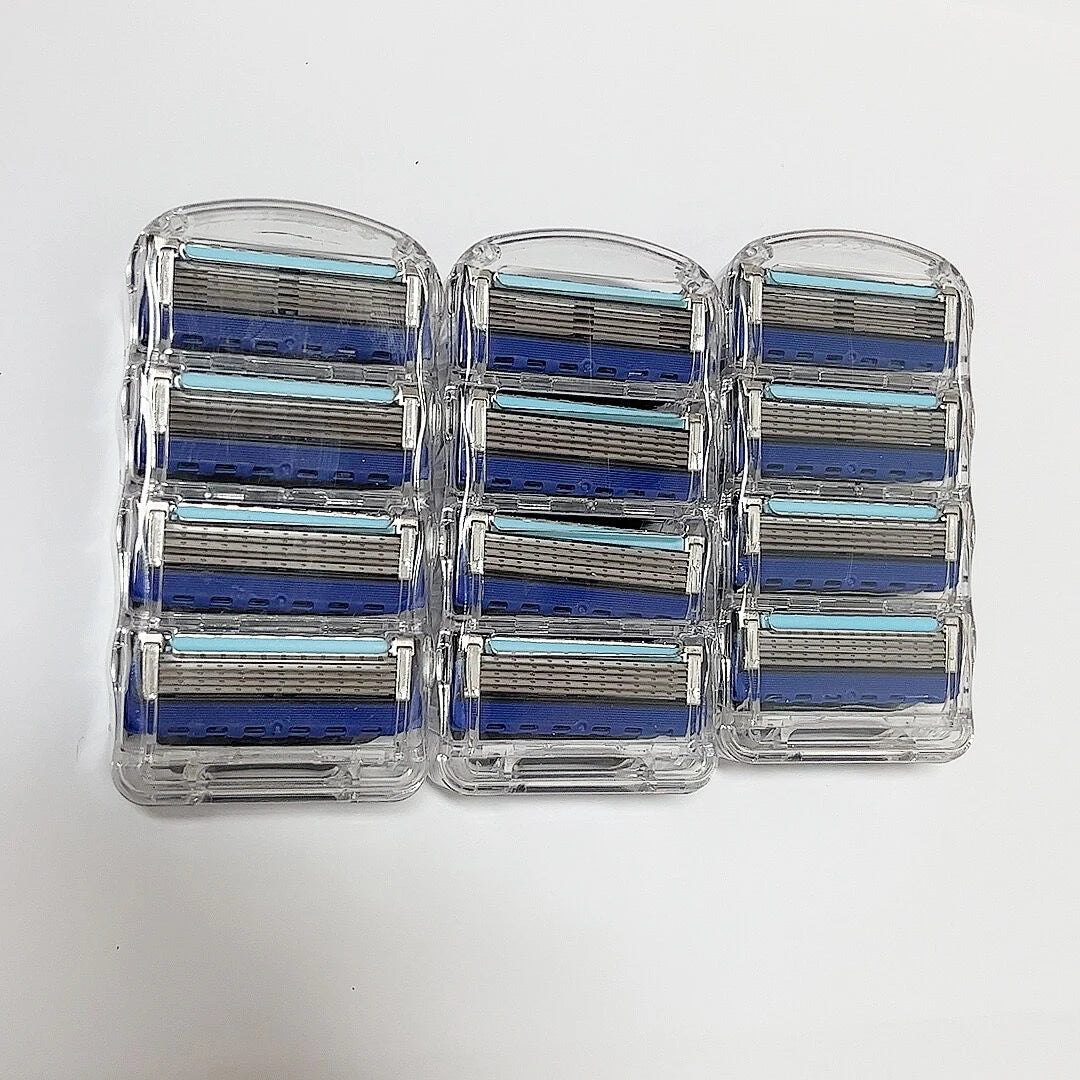Set of razor blades in clear plastic cases on a white background