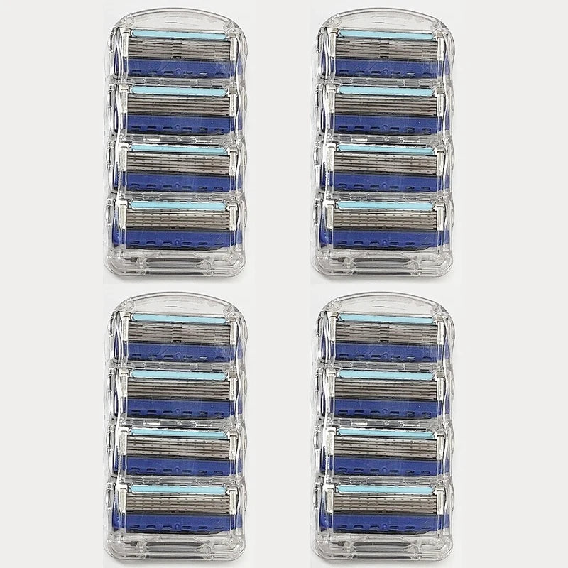 Four packs of razor heads with blue and silver blades on a white background