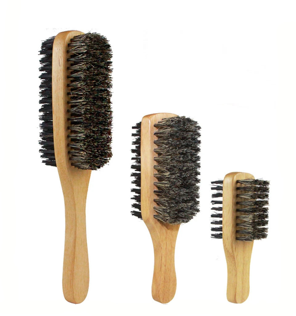 Three wooden hairbrushes with bristle heads on a white background