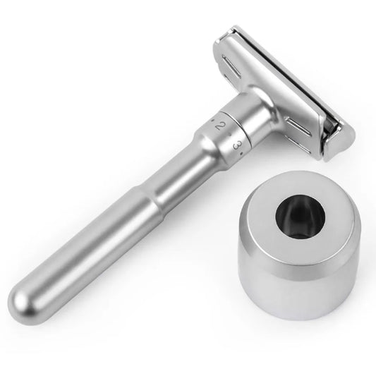 Silver safety adjustable razor with stand on a white background