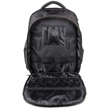Black backpack with multiple compartments on a white background