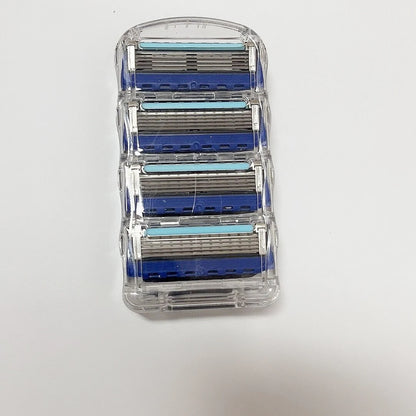 Set of razor blades in a clear plastic case on a white background