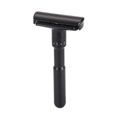 Black safety razor on a white background