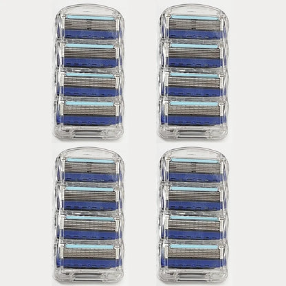 Four packs of razor heads with blue and silver blades on a white background